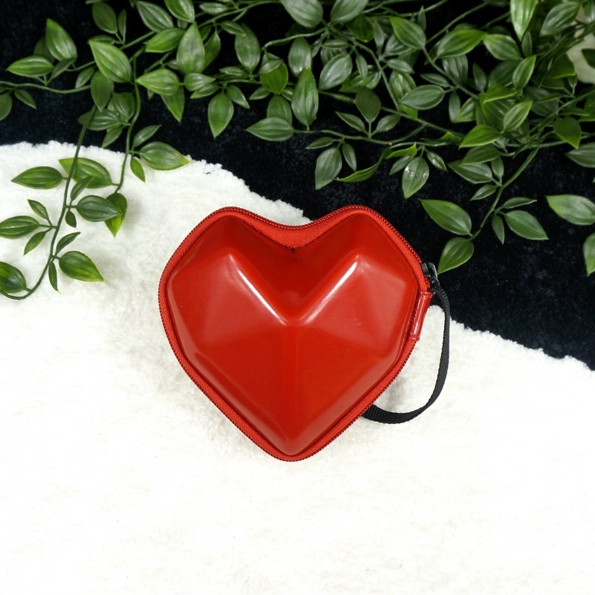 Petit sac cosmétique tridimensionnel portable en forme de coeur