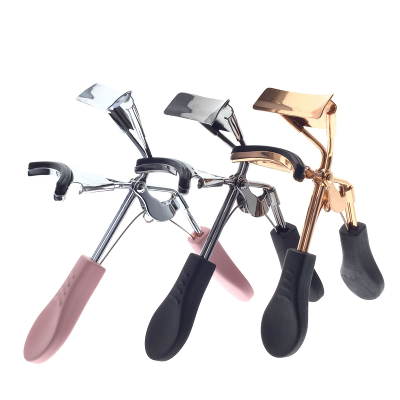 Recourbe-cils à manche en silicone rose noir avec coussinets de recharge