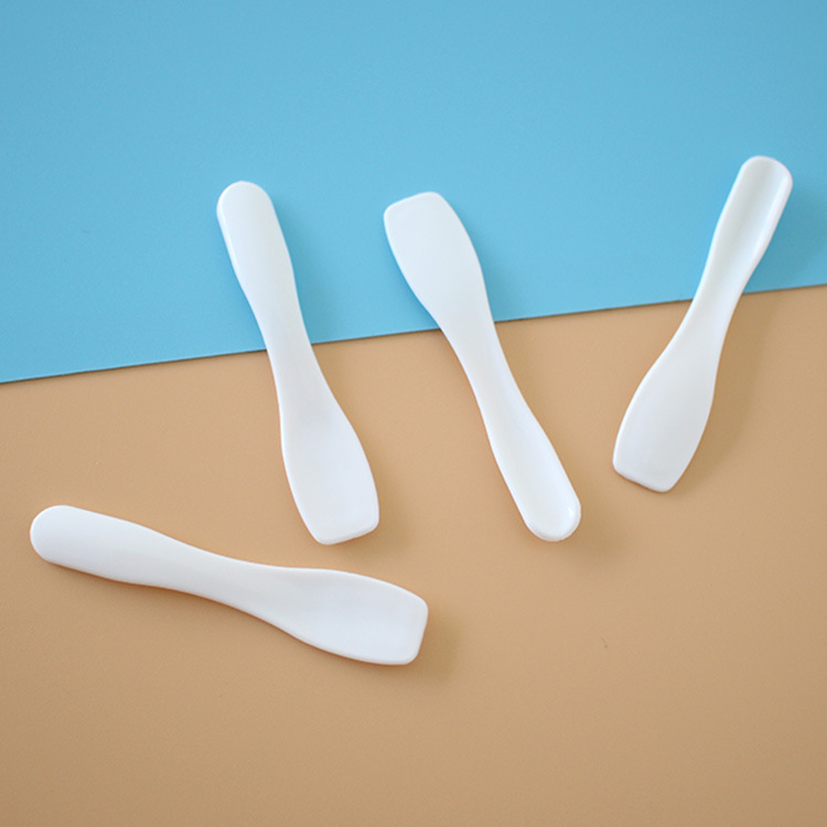 Spatule cosmétique jetable pour soins du visage blanc